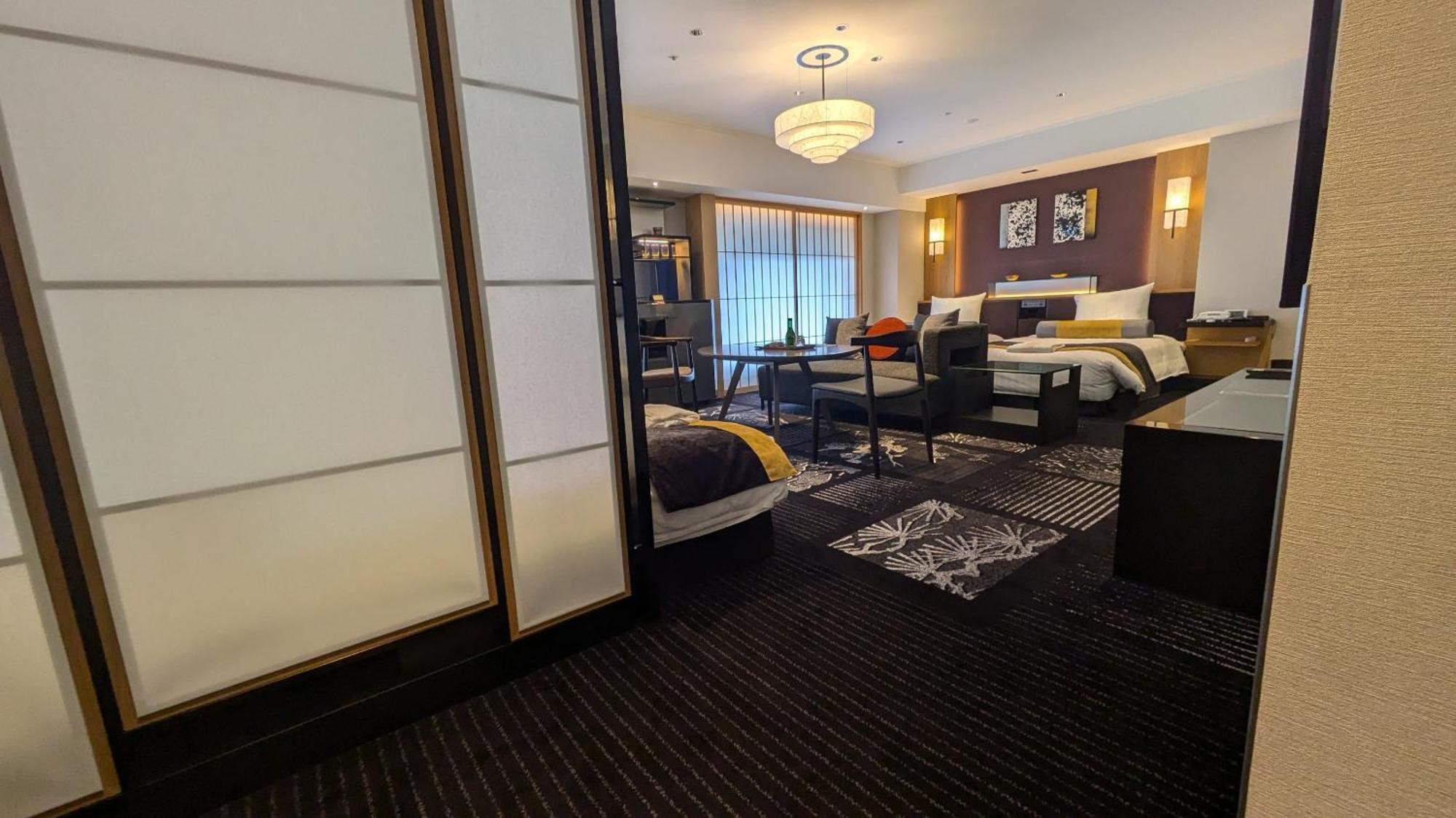 Hotel New Otani Oszaka Kültér fotó A room at the hotel